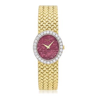 Ultra-Rare Piaget Ladies' Watch in 18K Gold with Ruby Dial