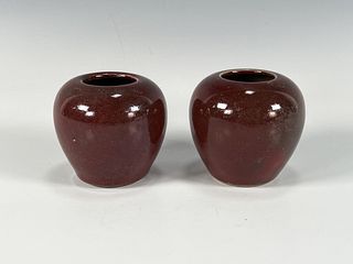 TWO SMALL OXBLOOD POTS