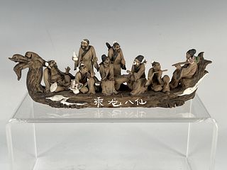 SCHOLARS ON A DRAGON BOAT