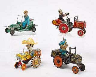 Four Old Toy Cars