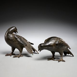 Pair patinated cast iron pigeons