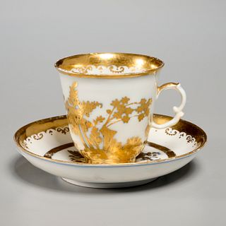 Antique Meissen gilt porcelain cup and saucer