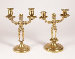 Near Pair of European Brass "Bearded Man" Two-Light Candlesticks, 19th Century