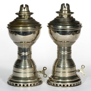 NICKEL-PLATED BRASS MAY'S NEW IDEAL MECHANICAL KEROSENE STAND LAMPS, PAIR