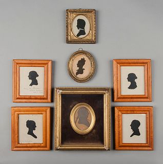 Collection of seven hollow cut silhouettes.