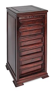 Chinese hardwood stand with a tambour door, 31 1/2