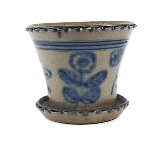 Large stoneware flowerpot, 19th c., with floral de