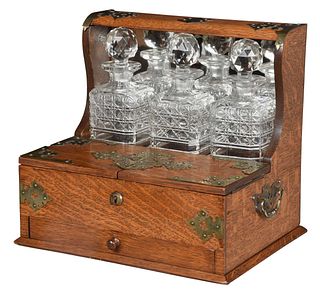 Oak Mirror Back Tantalus with Three Cut Glass Decanters