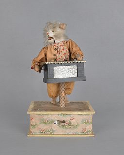 Musical automaton cat playing an organ grinder