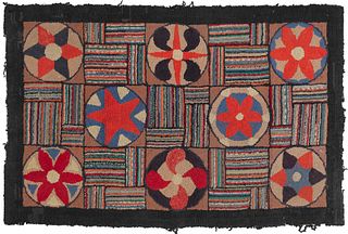 Pennsylvania hooked rug, early 20th c., with pinwh