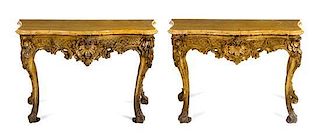 * A Pair of Rococo Style Giltwood Console Tables Height 37 x width 58 x depth 26 inches.