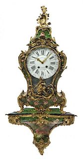 A Louis XV Style Painted and Gilt Bronze Mounted Bracket Clock Height 54 inches.