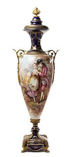 A Gilt Bronze Mounted Sevres Style Porcelain Urn Height 43 1/4 inches.