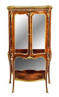 A Louis XV Style Gilt Bronze Mounted Kingwood Vitrine Height 62 3/4 x width 36 x depth 15 inches.