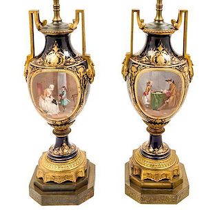 * A Pair of Sevres Style Gilt Bronze Mounted Porcelain Urns Height 15 1/2 inches.