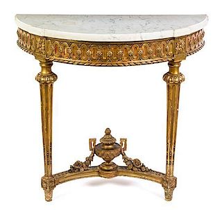 * A Louis XVI Style Giltwood Console Table Height 31 x width 33 1/2 x depth 16 1/4 inches.