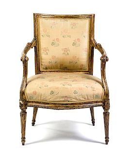 * A Louis XVI Giltwood Fauteuil Height 35 inches.