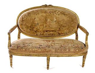 A Louis XVI Style Giltwood Settee Height 45 x width 63 x depth 24 5/8 inches.