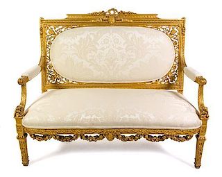 * A Louis XVI Style Giltwood Settee Height 45 x width 55 x depth 24 1/2 inches.