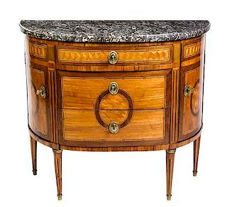 A Louis XVI Gilt Bronze Mounted Parquetry Commode Height 33 x width 38 x depth 17 inches.