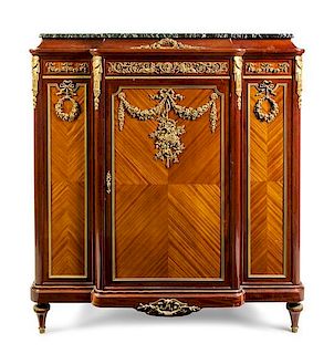 A Louis XVI Style Gilt Bronze Mounted Satinwood and Mahogany Cabinet Height 56 x width 52 1/8 x depth 19 3/4 inches.
