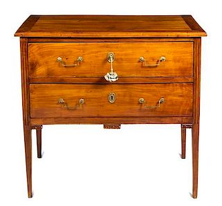 * A Directoire Fruitwood Commode Height 34 3/4 x width 37 1/4 x depth 19 5/8 inches.