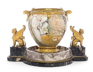 * An Empire Style Gilt Bronze Mounted Marble Centerpiece Height 11 x width 17 inches.