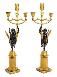 * A Pair of Gilt and Patinated Bronze Two-Light Figural Candelabra Height 21 3/4 inches.