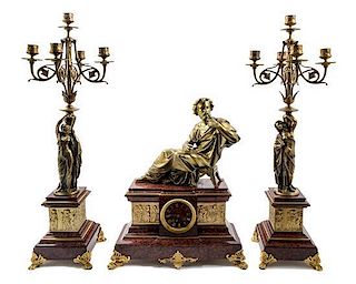 * A Gilt Bronze Mounted Marble Clock Garniture Height of candelabra 26 1/4 inches.
