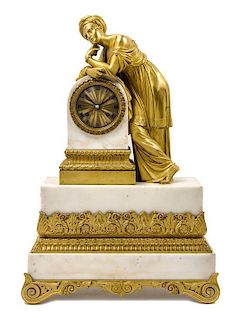 * A French Gilt Bronze Mounted Marble Mantel Clock Height 21 inches.
