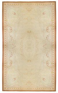 * A Napoleon III Aubusson Wool Carpet 20 feet 8 inches x 13 feet 4 inches.