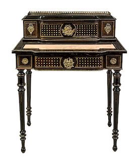 * A Napoleon III Ebonized and Mother-of-Pearl Inset Work Table Height 36 3/4 x width 29 1/2 x depth 19 inches.