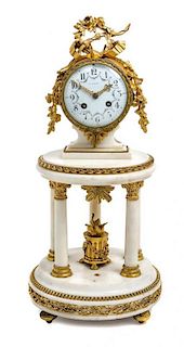 A French Gilt Bronze and Marble Mantel Clock Height 19 1/2 inches.