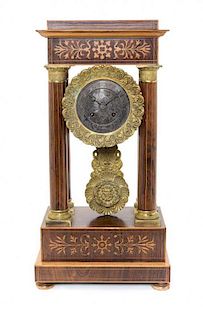A Napoleon III Rosewood and Marquetry Portico Clock Height 18 inches.