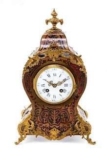 A Napoleon III Style Boulle Marquetry Mantel Clock Height 14 1/2 inches.