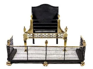 A Neoclassical Brass Fire Fender and Fireplace Grate Height of grate 31 inches; width of fender 47 1/2 inches.