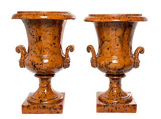 * A Pair of Glazed Ceramic Urns Height 21 3/4 inches.