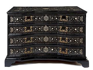 * An Italian Ebony Chest of Drawers Height 40 1/4 x width 50 1/2 x depth 26 1/2 inches.