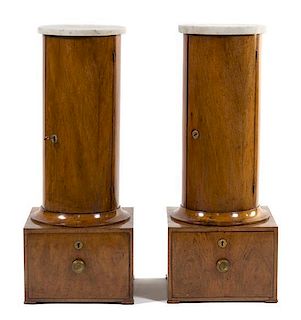 * A Pair of Italian Walnut Pedestal Cabinets Height 38 3/4 inches.