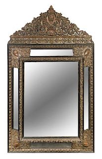 A Dutch Baroque Style Pressed Metal Mirror Height 65 x width 40 inches