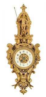 * A Neoclassical Gilt Bronze Cartel Clock Height 30 1/2 inches.