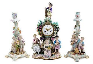 An Assembled Meissen Porcelain Clock Garniture Height of clock 15 1/4 inches.