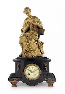 * A Continental Gilt Bronze and Slate Mantel Clock Height 19 inches.