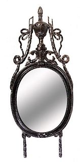 A Neoclassical Style Black Painted Mirror Height 57 inches.