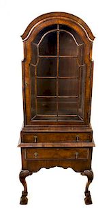 A William and Mary Style Walnut Vitrine Height 72 x width 28 1/2 x depth 15 1/4 inches.