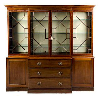 * A George III Style Mahogany Breakfront Bookcase Height 85 1/2 x width 86 1/2 x depth 20 inches.