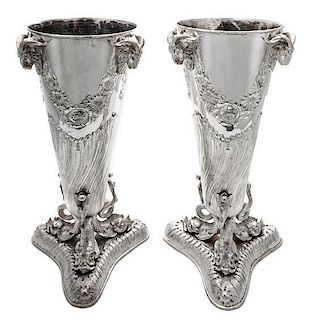 * A Pair of Silver-Plate Vases Height 17 inches.