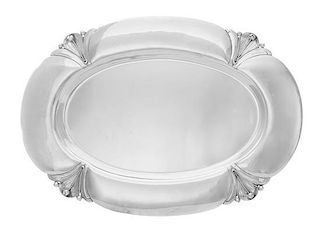 An American Silver Serving Dish, Redlich & Co., New York, NY, of oval form, the border decorated with foliate and floral bud 