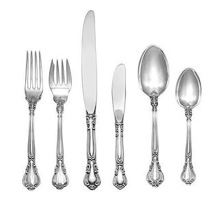 An American Silver Flatware Service, Gorham Mfg. Co., Providence, RI, Chantilly pattern, comprising: 8 luncheon knives 12 but