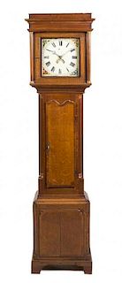 * An American Oak Tall Case Clock Height 82 inches.